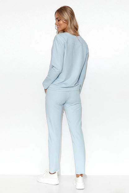 Elegant Makadamia Women's Tracksuit Set featuring a stylish V-Neck Blouse with long sleeves and tailored Straight Leg Pants, ideal for a chic and minimalist wardrobe.