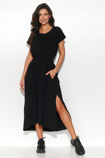 Chic Numinou Long Asymmetrical Dress with a fashionable silhouette and convenient side pockets, made for effortless elegance.