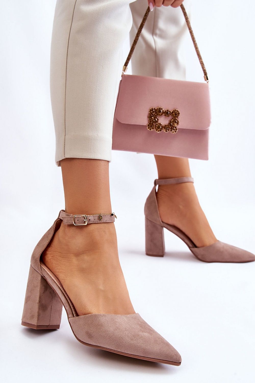 Close-up view of Elegant Pointed-Toe Block Heel Pumps in Eco-Suede with Ankle Strap, highlighting the premium eco-suede fabric and buckle detail.