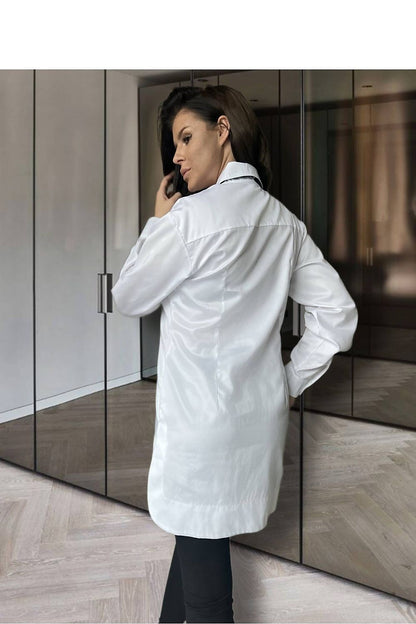 Model showcasing the Elegant Cotton Long Sleeve Button-Down Shirt for Women by O La La, highlighting its elegant design and fit.