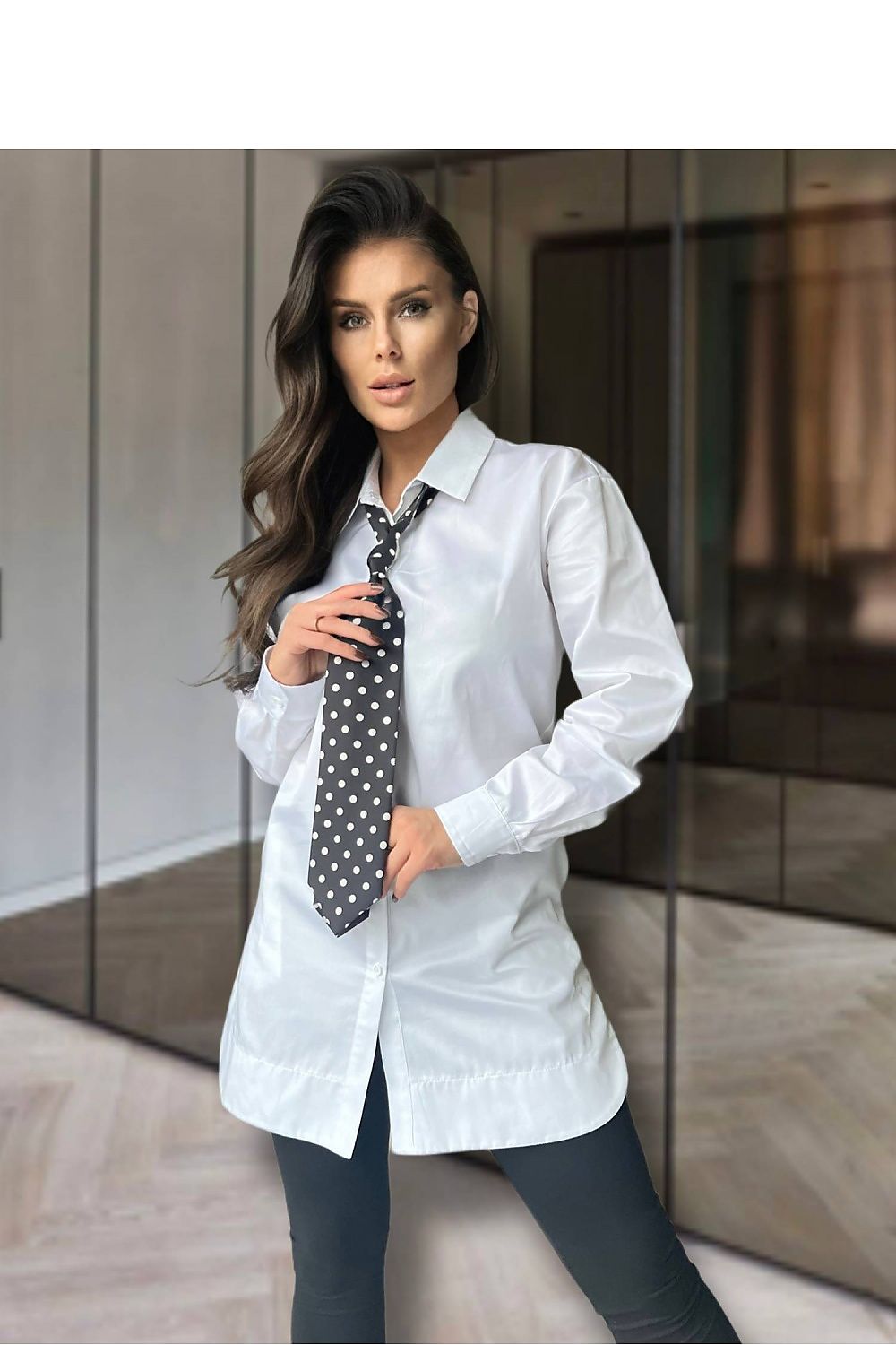 Detailed view of the button-down style of the Elegant Cotton Long Sleeve Button-Down Shirt for Women by O La La.