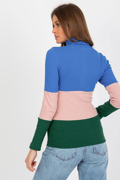 Elegant Women's Ribbed Turtleneck Sweater displayed elegantly on a mannequin, highlighting its chic long sleeve silhouette and available in three stylish colours.