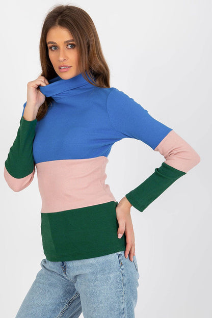 Elegant Women's Ribbed Turtleneck Sweater folded neatly, featuring high-quality cotton blend fabric in an array of three luxurious colours, perfect for layering.