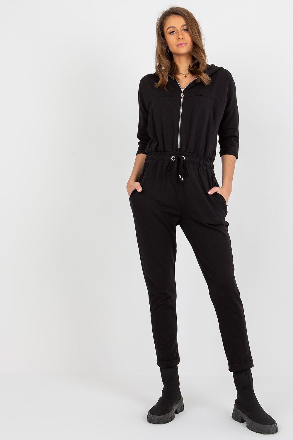 Elegant women's hooded jumpsuit by Relevance featuring 3/4 sleeves, a zippered front, and practical side pockets in a luxurious cotton blend.