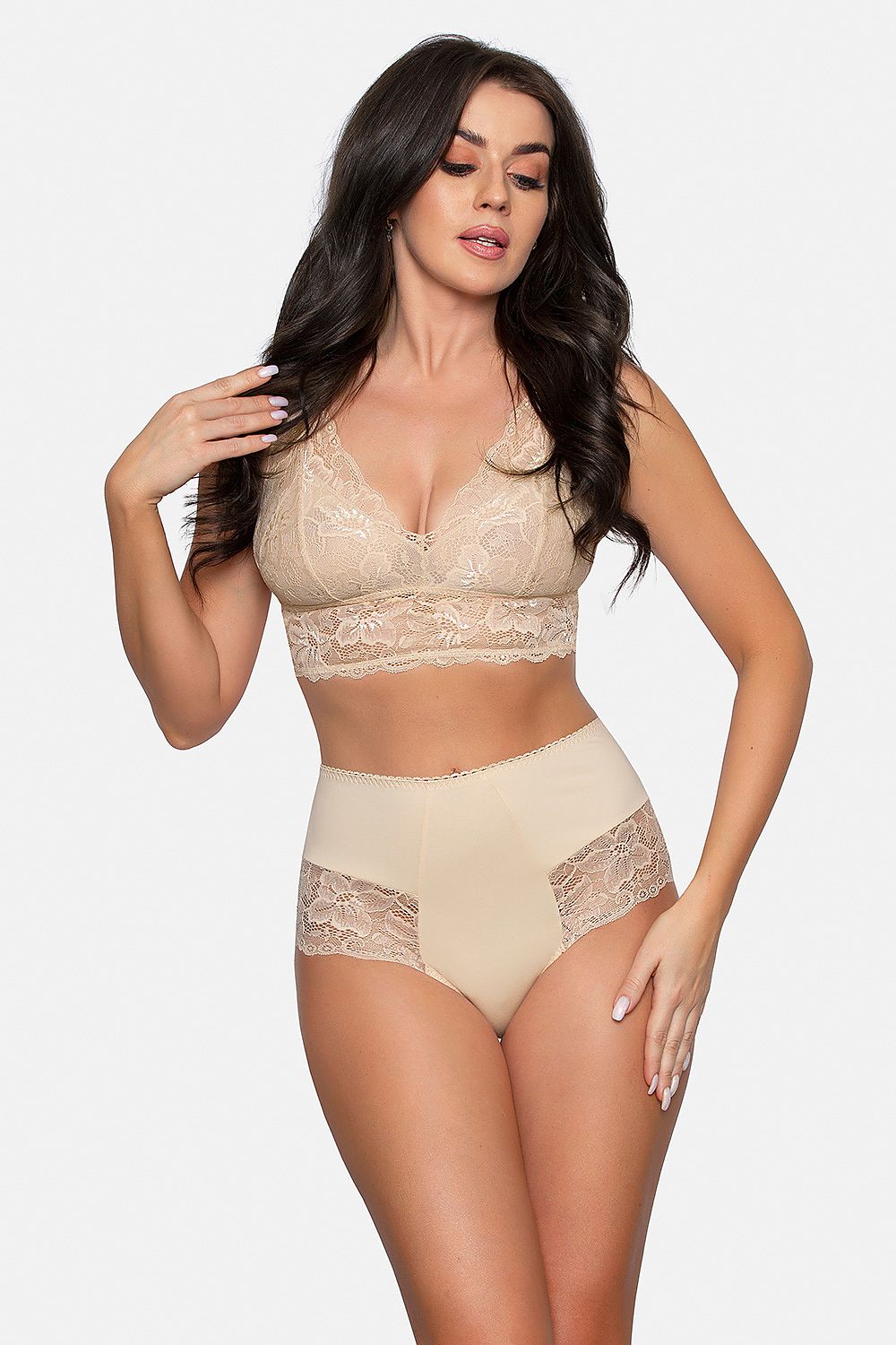 Attractive model in luxury high-waisted beige cotton panties adorned with lace inserts by Babell, embodying comfort and luxury.