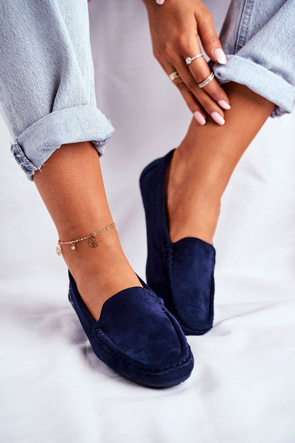 Chic navy suede moccasins with a comfortable design, enhanced with a natural leather footbed for ultimate luxury, by Step in style.