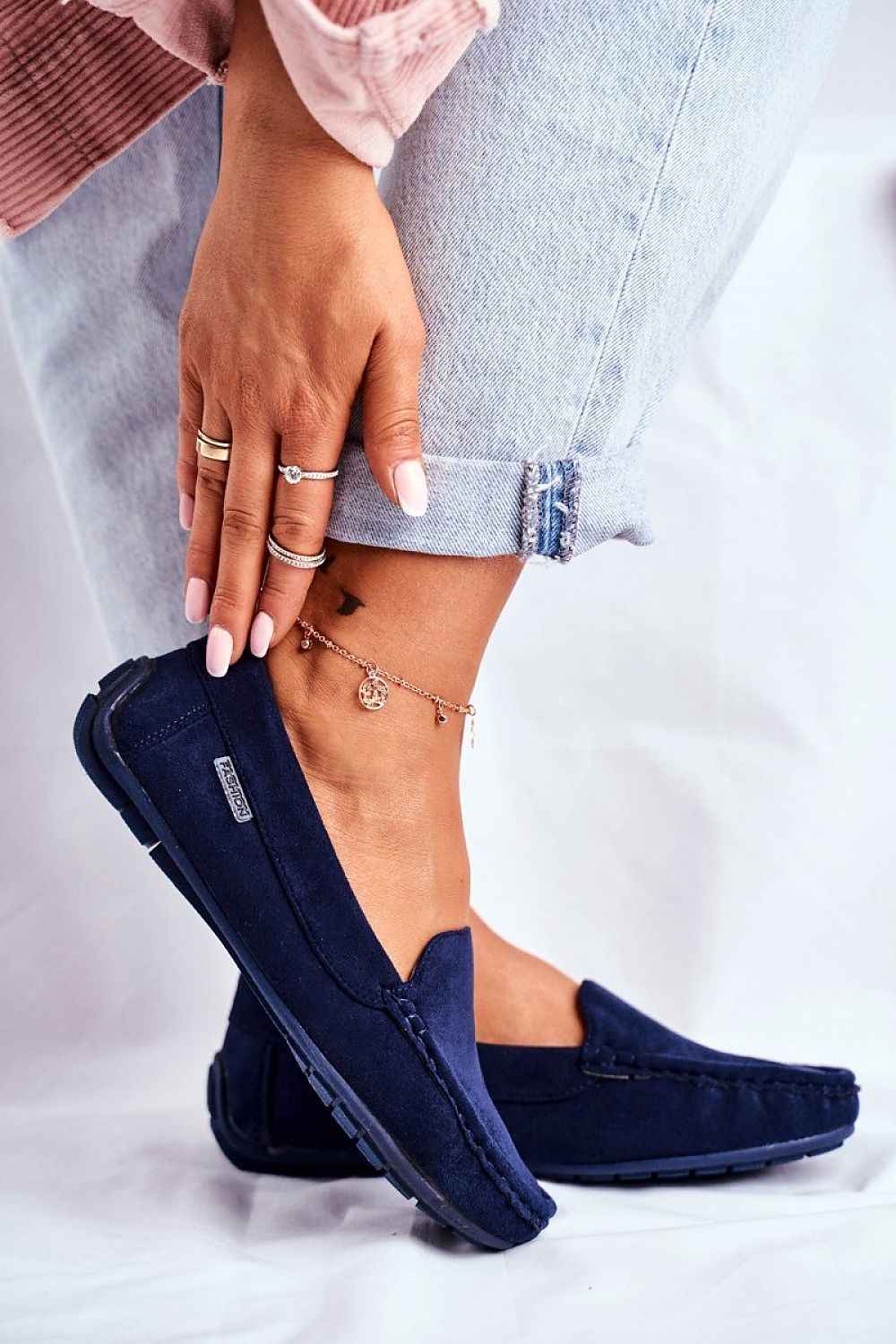 Stylish navy moccasins with a sleek profile, offering a blend of comfort and elegance with a natural leather insole, designed by Step in style.