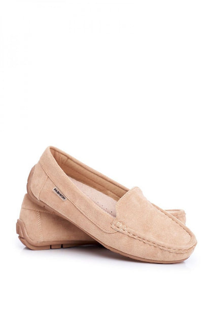 Stylish pair of lightweight suede moccasins displayed elegantly, showcasing a natural leather insole, crafted by Step in Style for sophisticated comfort.