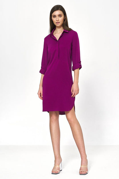 Stylish front view of the Nife oversized viscose daydress, highlighting its versatile design and sophisticated collar detail.