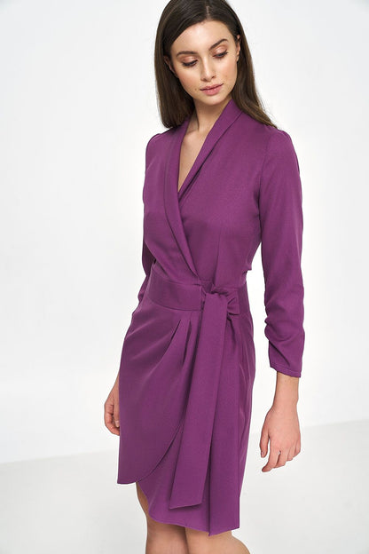 Elegant purple spandex-blend daydress by Nife featuring a sophisticated envelope neckline and a flattering feminine silhouette, perfect for special occasions.