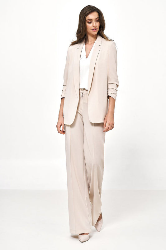 Nife women's elegant jacket paired with wide-leg trousers, showcasing a chic soft office style, perfect for both casual and professional settings.