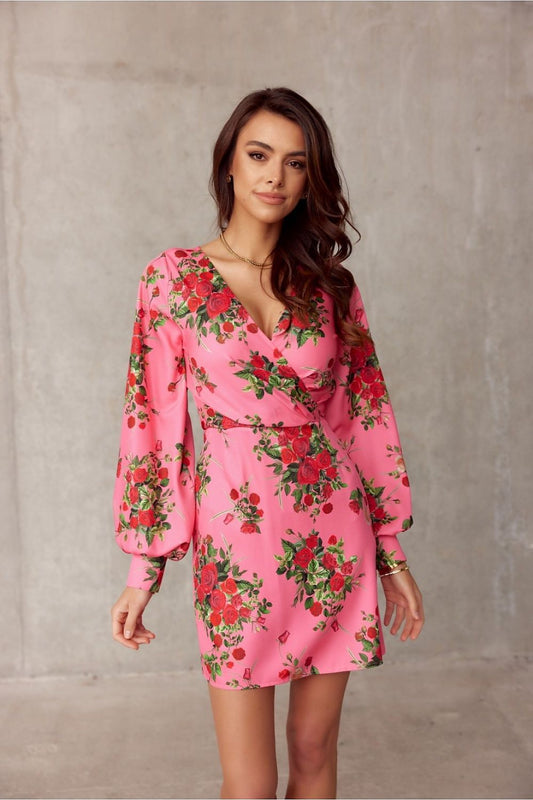 Elegant pink floral mini cocktail dress with deep neckline and long sleeves by Roco Fashion, perfect for special occasions.