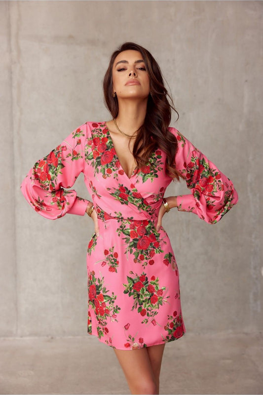 Chic pink floral mini dress featuring a deep V-neckline and gently flared sleeves by Roco Fashion, ideal for creating a striking look.