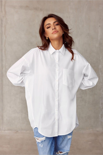 Stylish front view of white oversized long sleeve shirt by Roco Fashion, featuring a relaxed fit and elegant detailing, perfect for luxurious everyday wear.
