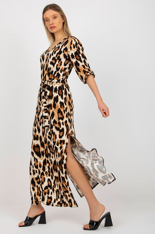 Elegant Lakerta long dress featuring a chic leopard print, a heart neckline, 3/4 sleeves, and a stylish tie belt, perfect for sophisticated occasions.