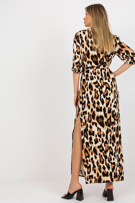 Sophisticated back view of the luxurious Lakerta long dress with a striking leopard pattern, showcasing its elegant design, 3/4 sleeves and figure-flattering silhouette.