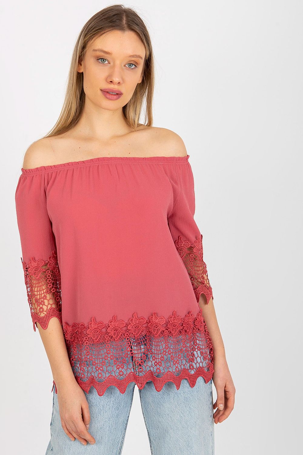 Chic Lakerta blouse with a stunning off-shoulder design, adorned with finely crafted lace trim, encapsulating timeless elegance.