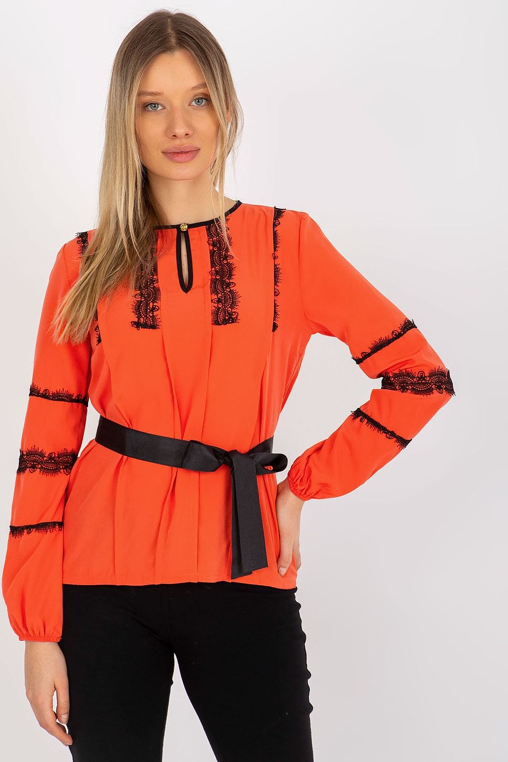 Stunning Lakerta long sleeve blouse in bold orange with exquisite lace detailing and a refined tie belt for a sophisticated appearance.