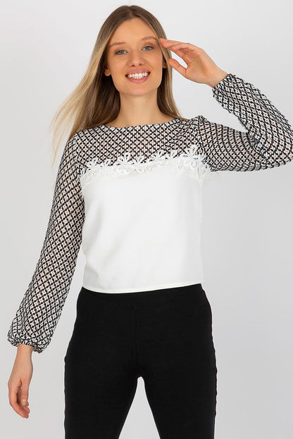 Sophisticated model showcasing elegant lace sleeve formal blouse by Lakerta, featuring a round neckline and exquisite detailing, perfect for any occasion.
