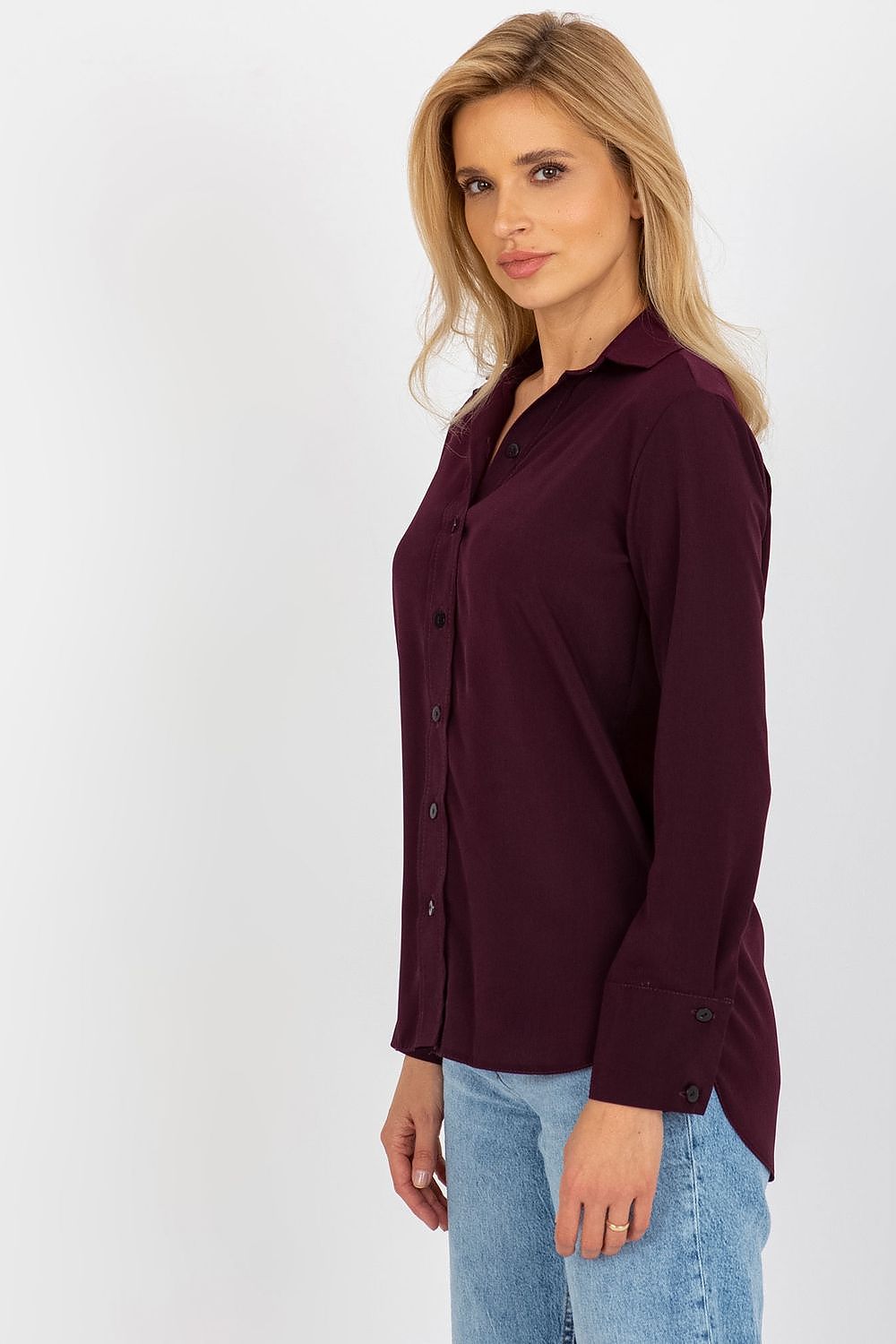 Side profile of a Lakerta women's button-down shirt in burgundy, showcasing its luxurious fabric and contemporary fit.