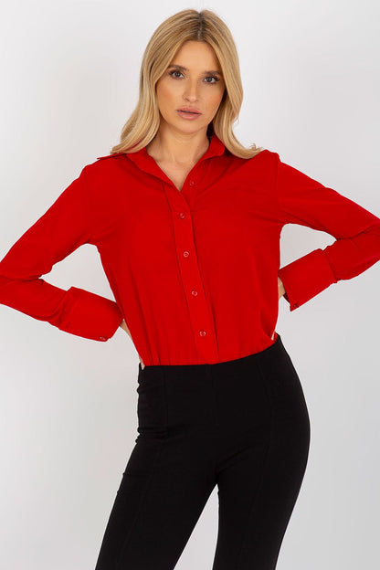 Striking close-up of Lakerta's women's button-down shirt in vivid red, designed for a stylish, elevated look.