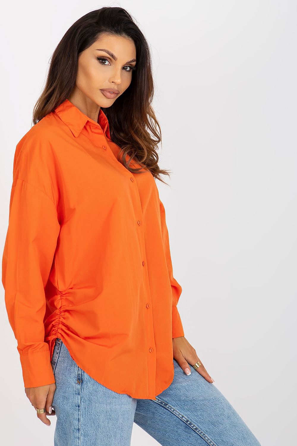 Sophisticated women's orange long sleeve shirt with button-down front and adjustable side ties, offered by Factory Price.