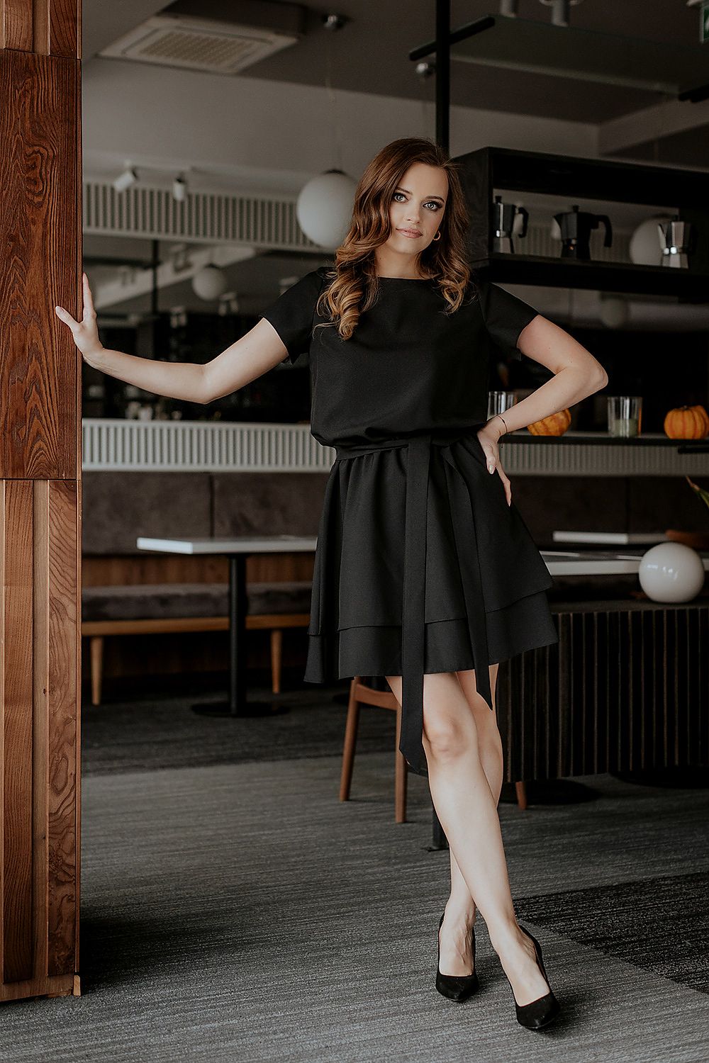 The complete Tessita luxurious daydress styled with a matching belt, exemplifying sophistication and elegance for daytime events.