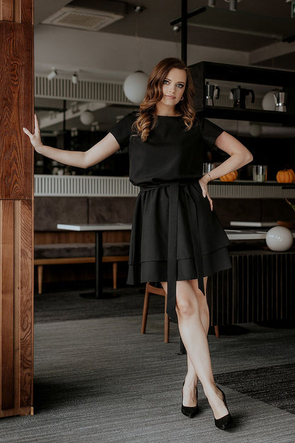 The complete Tessita luxurious daydress styled with a matching belt, exemplifying sophistication and elegance for daytime events.