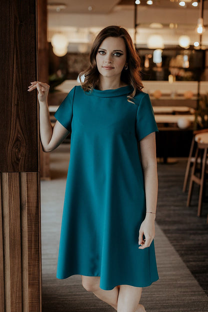 Elegant loose-fitting daydress with Jackie Kennedy collar by Tessita, showcasing a stylish design perfect for various occasions. Available in multiple sizes for a luxurious fit.