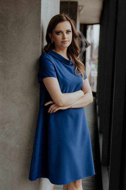 Elegant loose-fitting daydress by Tessita featuring a classic Jackie Kennedy collar, perfect for sophisticated casual occasions.