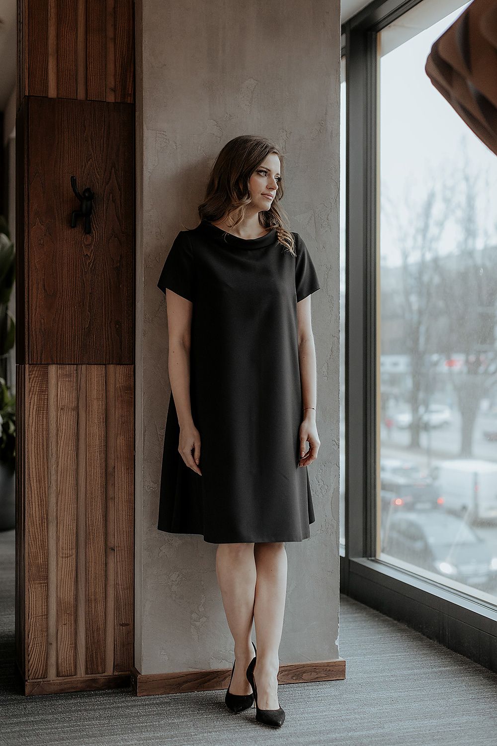 Flat lay of Tessita's Jackie Kennedy-style daydress, showcasing its unique design elements and luxurious fabric quality.