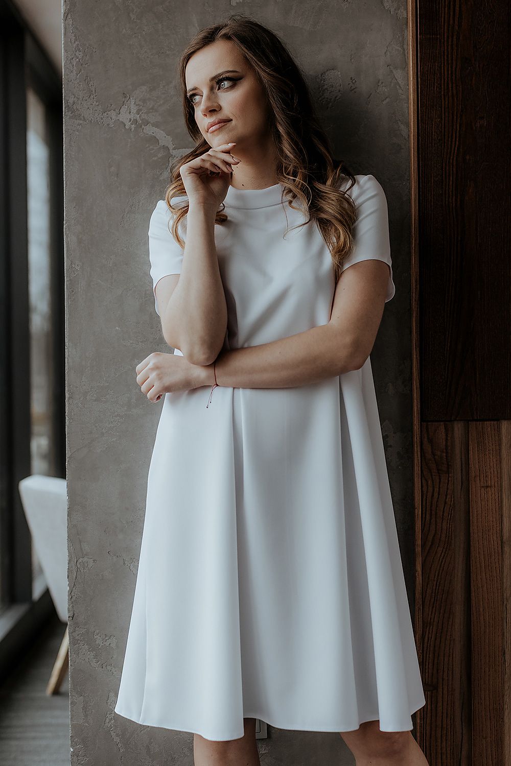 Upscale image of Tessita's loose-fitting daydress showcasing its soft fabric and refined design, ideal for versatile styling.