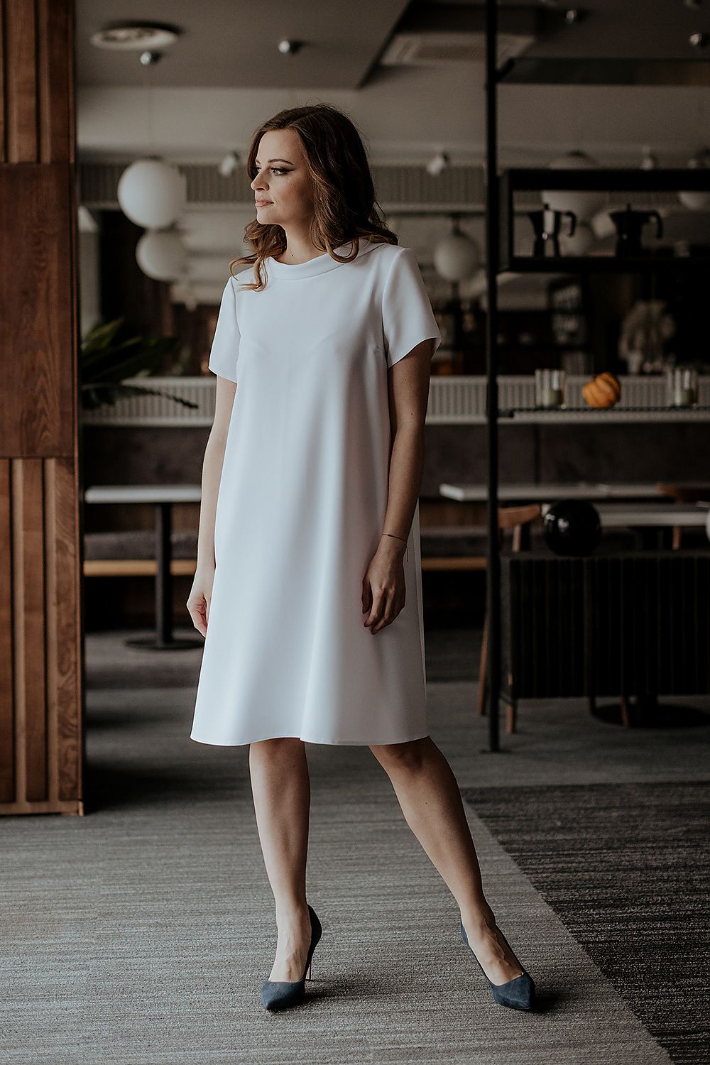 Detail view of the Jackie Kennedy collar on Tessita's elegant loose daydress, highlighting its luxurious craftsmanship.