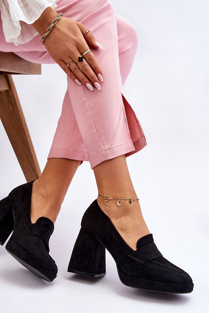 Luxury black eco-suede heel pumps by Step In Style, featuring a block heel and elegant design, paired with stylish pink trousers for a chic look.