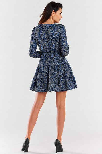 Elegant back view of the Awama A470 mini dress with long sleeves, featuring a delicate V neckline and charming frills, perfect for stylish occasions.