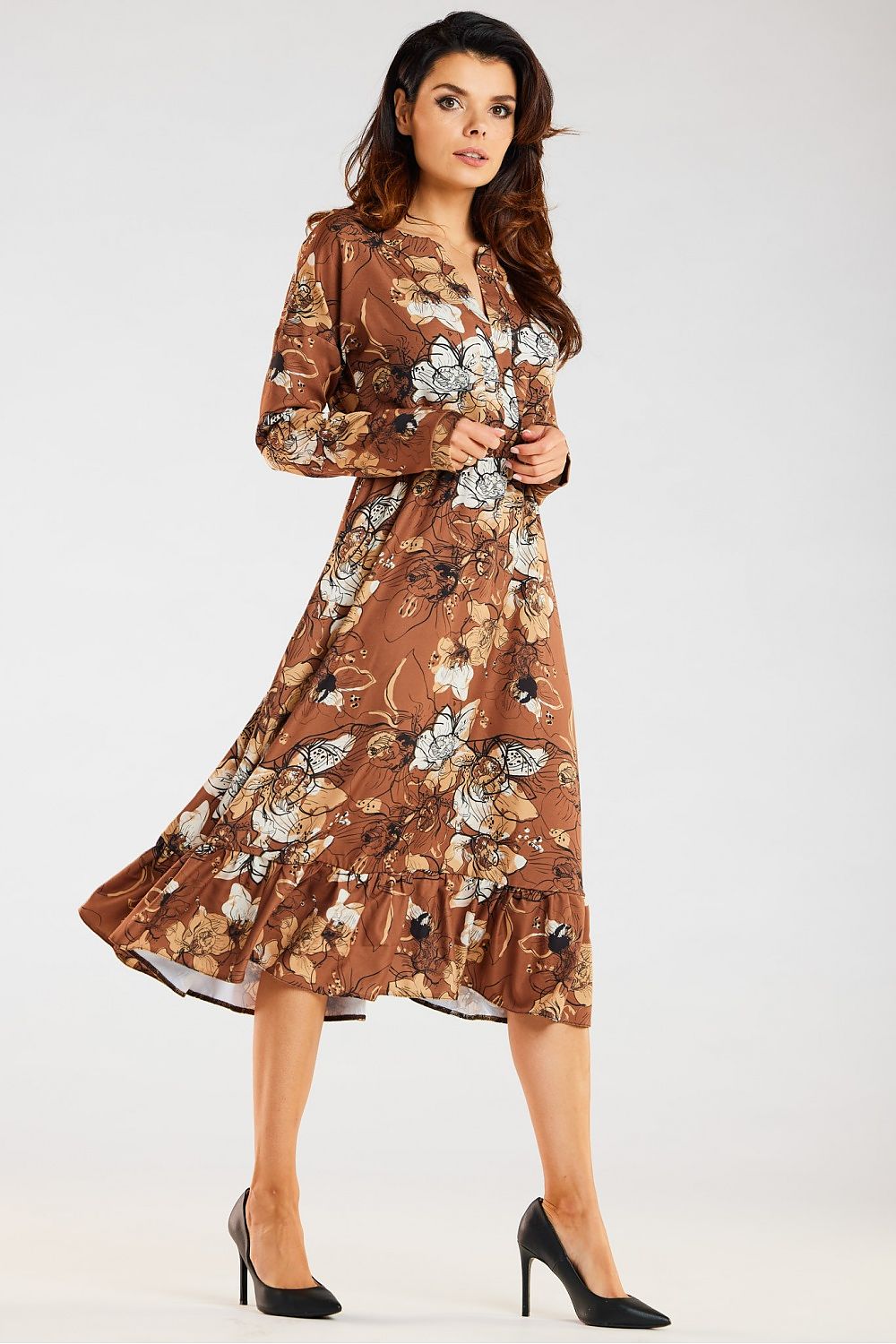 Elegant Awama midi dress with floral print and flared frill hem, capturing a luxurious style stance, designed for fashionable women.