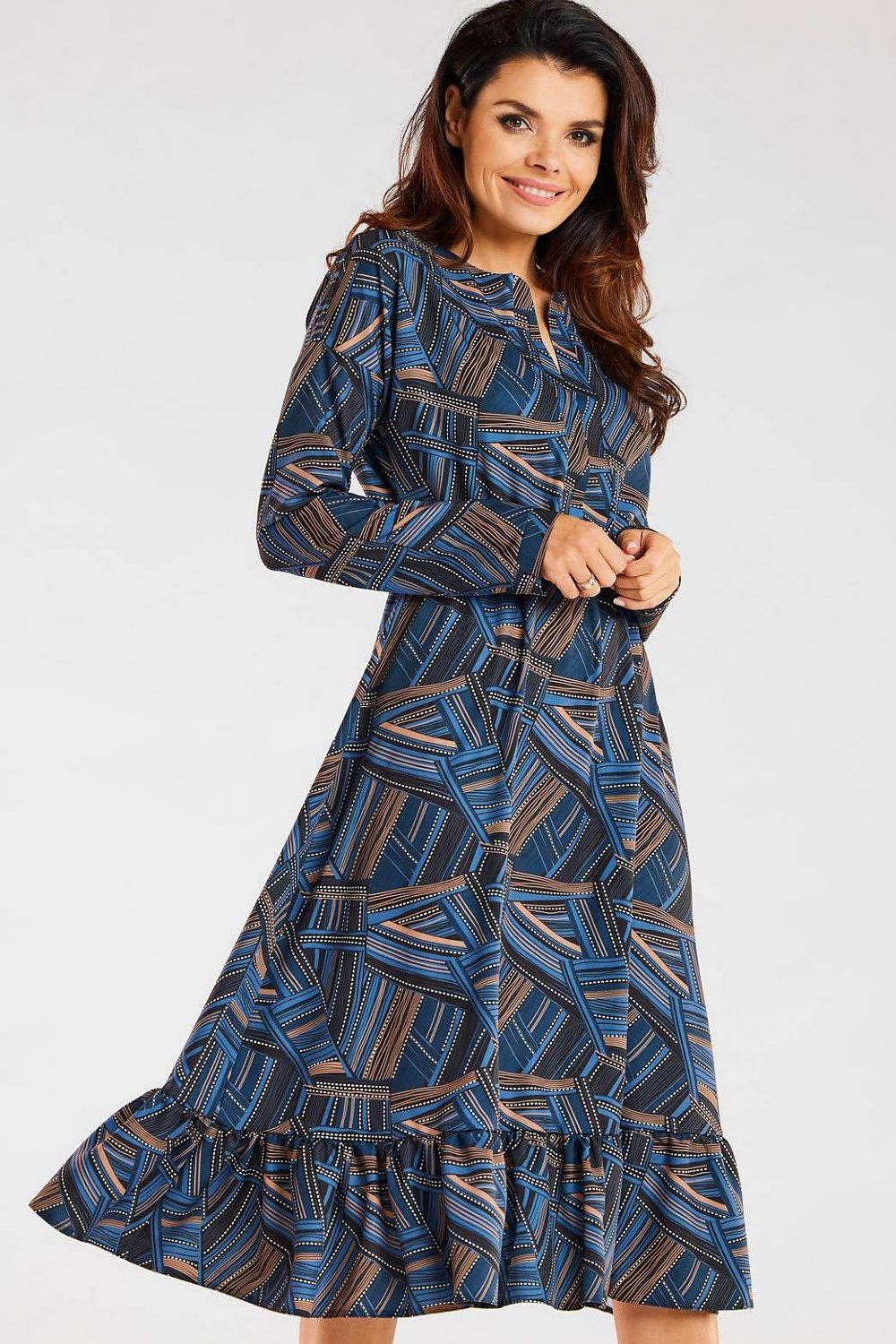 Elegant Midi Dress with long sleeves and flared frill hem by Awama, featuring distinct geometric patterns in blue and earthy tones, accentuating a sophisticated look for casual outings.