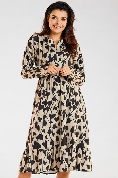 Chic Midi Dress by Awama, adorned with an artistic heart pattern against a beige background, designed with long sleeves and a flowing frill hem for an upscale casual appearance.