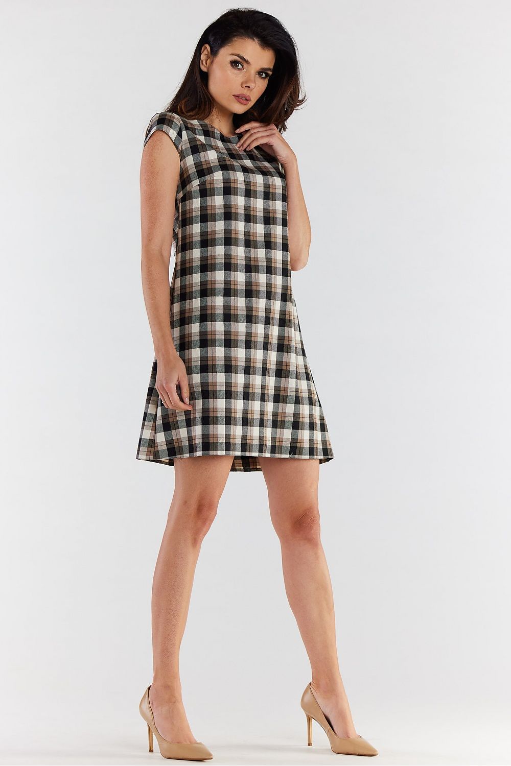 Close-up view of the elegant checkered mini dress with short sleeves by Awama, highlighting its luxurious fabric and flattering silhouette.