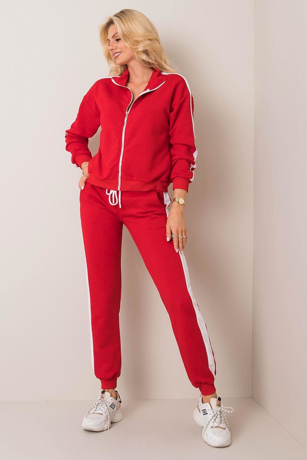 Elegantly styled BFG women's luxury zip-up sweatshirt set in vibrant red, featuring contrasting white piping, complemented with long sleeves and slip pockets, perfect for casual sophistication.