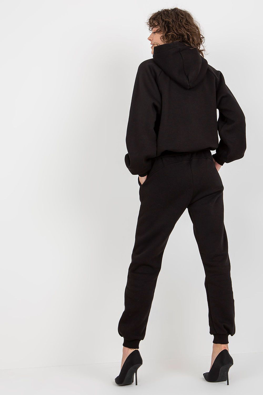 Ex Moda sophisticated black hoodie and joggers set from behind, demonstrating casual chic style with attention to detail.