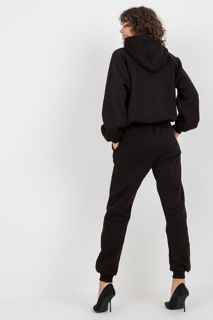 Ex Moda sophisticated black hoodie and joggers set from behind, demonstrating casual chic style with attention to detail.