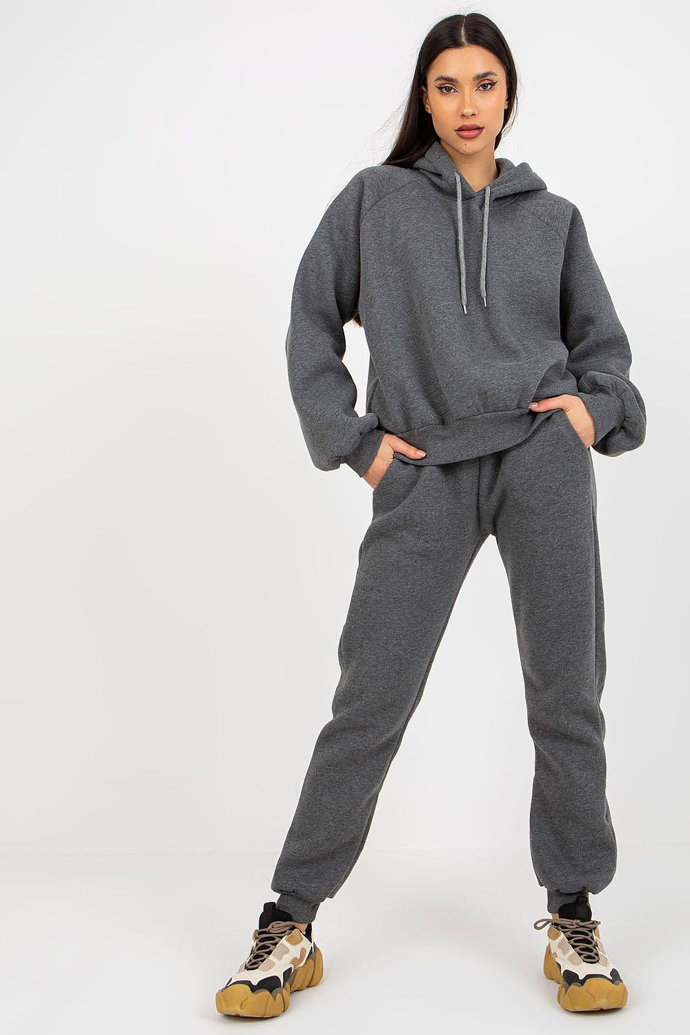 Sophisticated model wearing a grey Ex Moda Premium Cotton-Blend Sweatshirt Set, elegant hoodie and fitted long pants, perfect for stylish relaxation.
