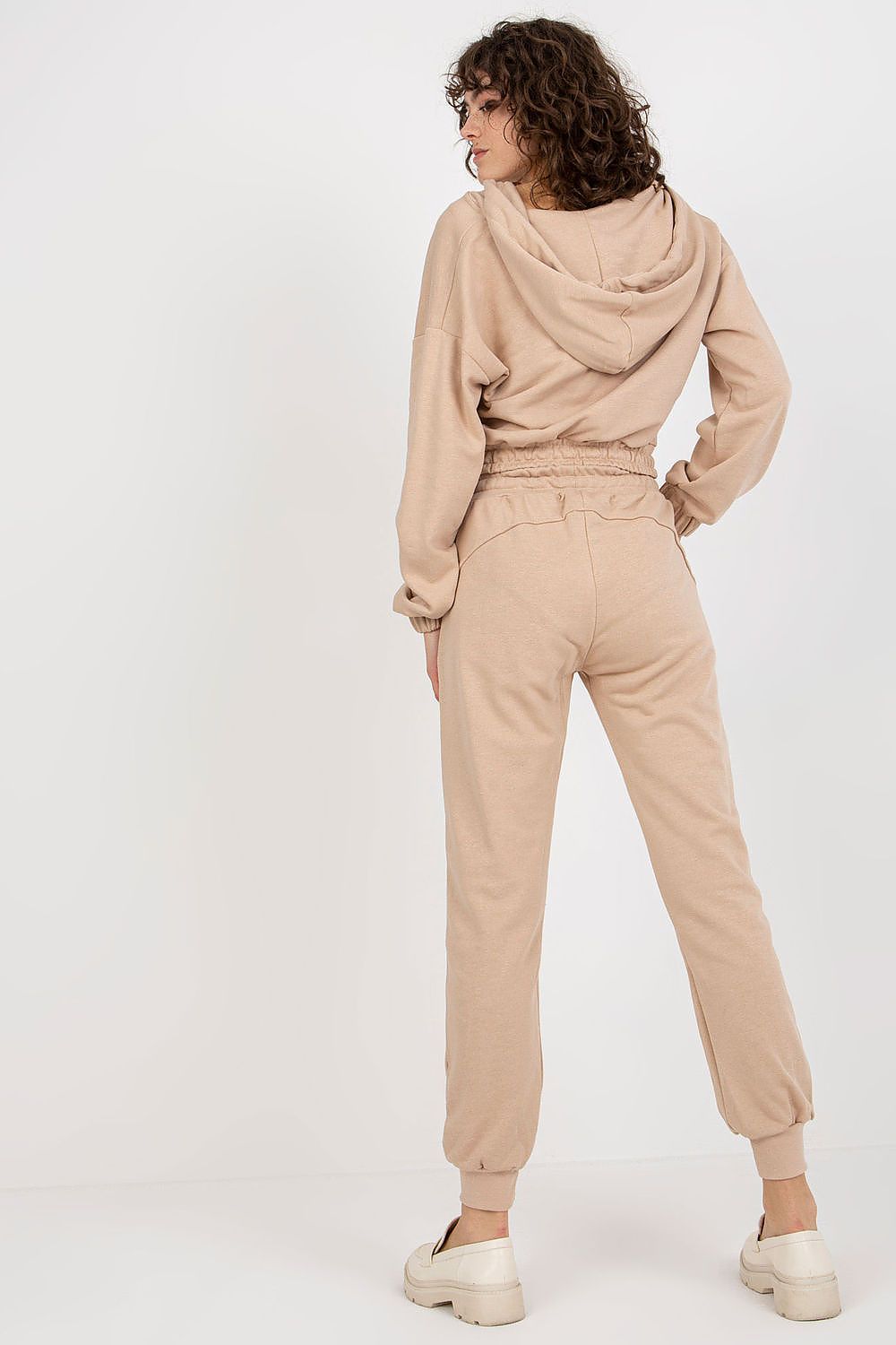 Ex Moda luxury beige sweatshirt set, highlighting the back view of a stylish hooded top and fitted trousers, perfect for relaxed yet refined wear.