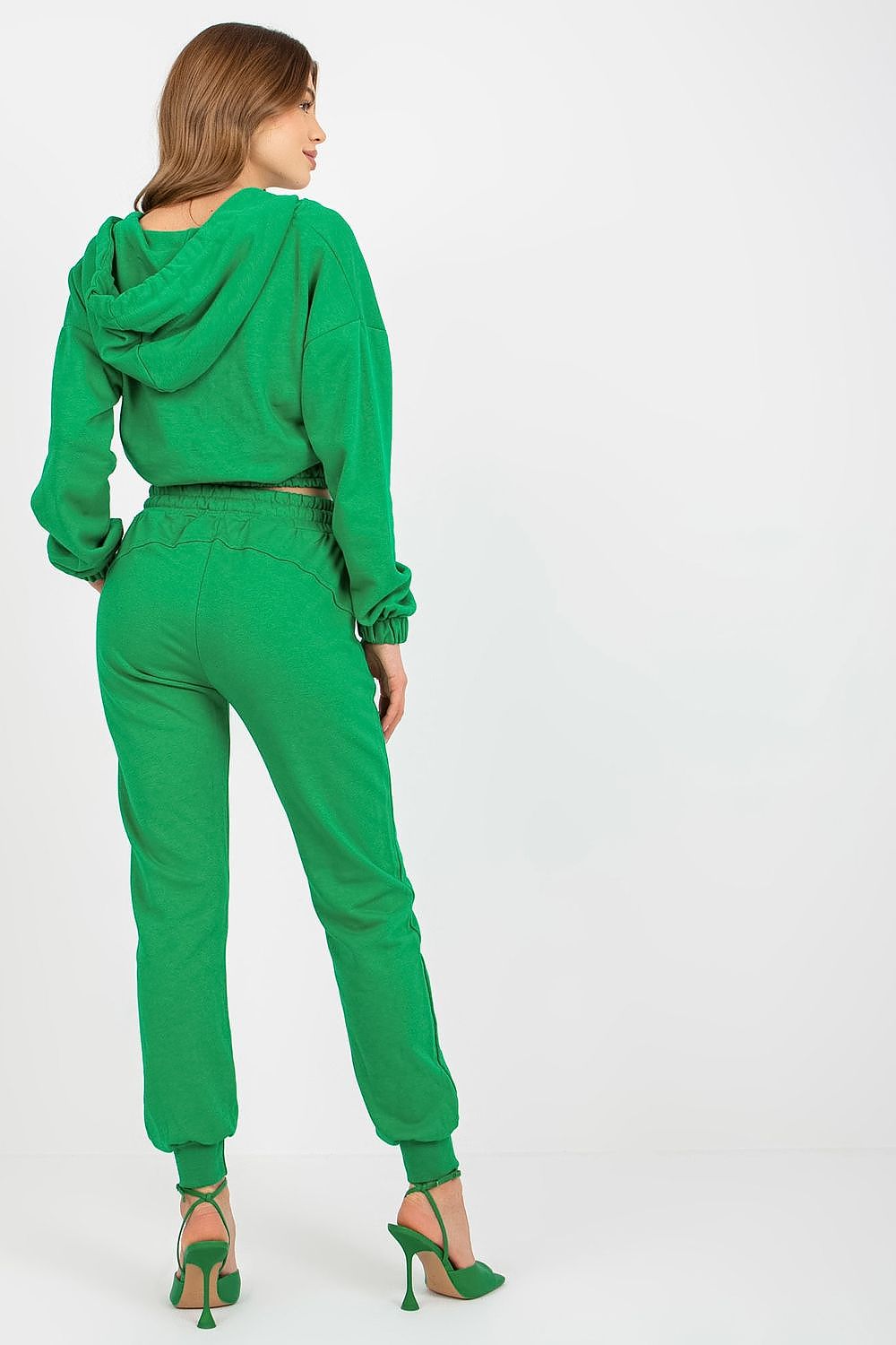 Back view of the Ex Moda luxury cotton blend set showcasing the green hoodie and matching pants with a stylish waist tie.
