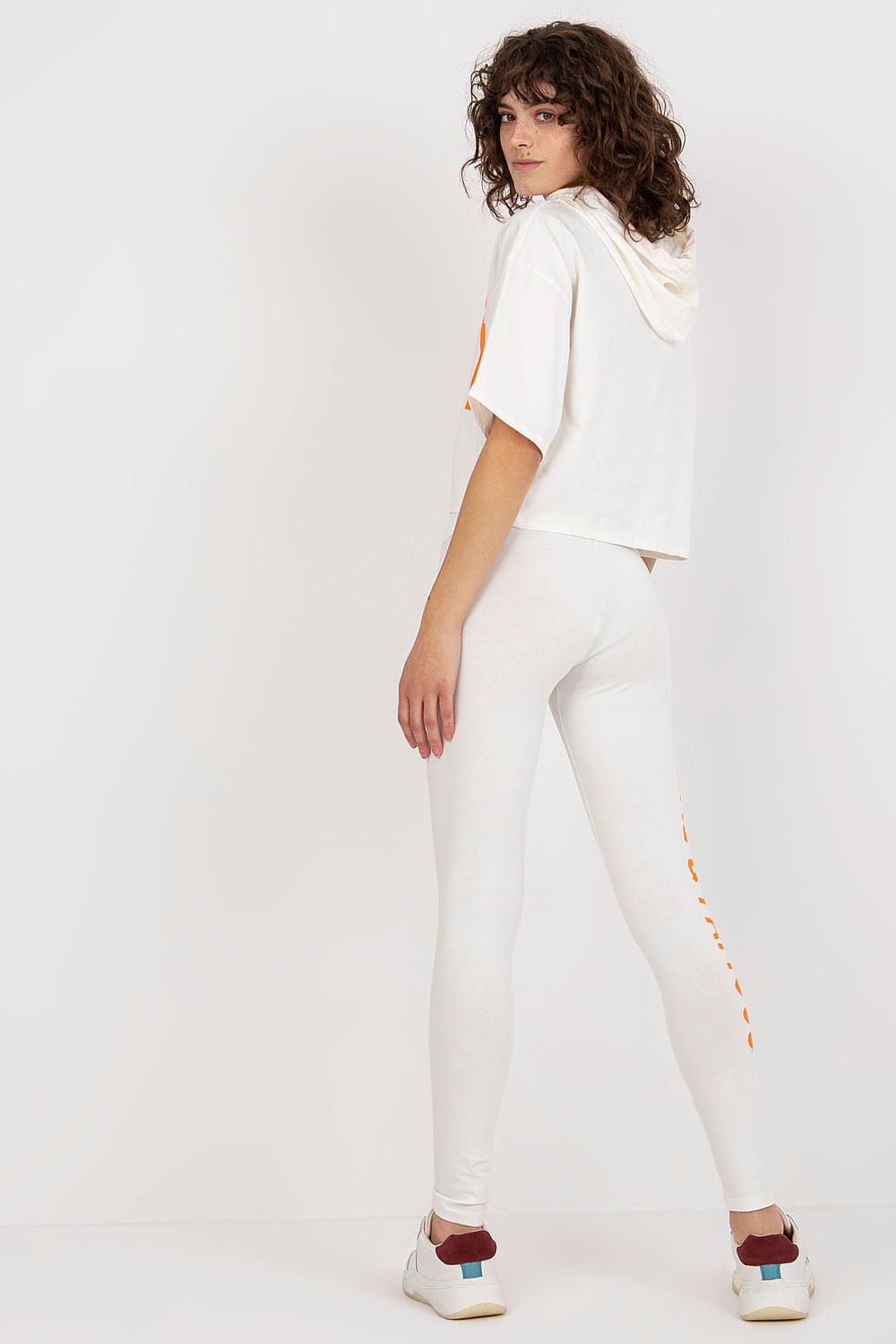 Back view of the Ex Moda women's cotton sweatshirt and leggings set in white, displaying the unique design and craftsmanship. This outfit exudes luxury while providing effortless style and comfort.