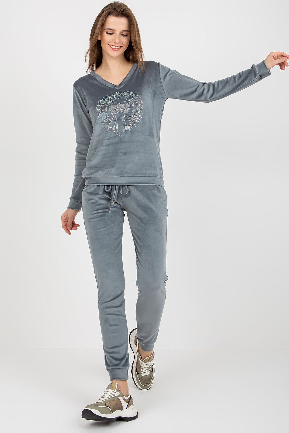 Luxury grey velour blouse and pants set by Relevance, showcasing a stylish heart neckline and elegant silhouette, perfect for comfort and sophistication.