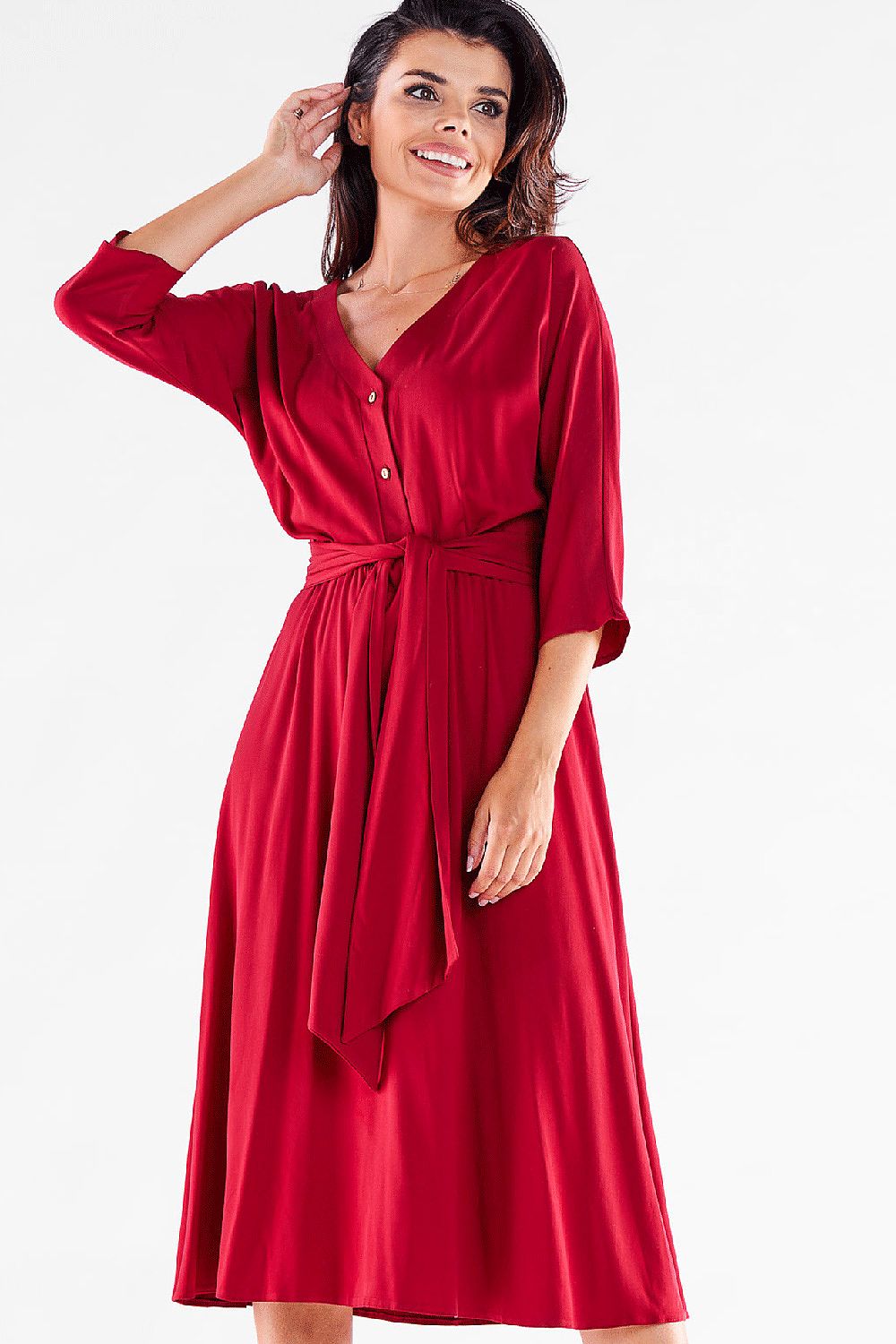 Elegant red midi dress by awama with a trapezoidal bottom and a stylish belt, perfect for any occasion.
