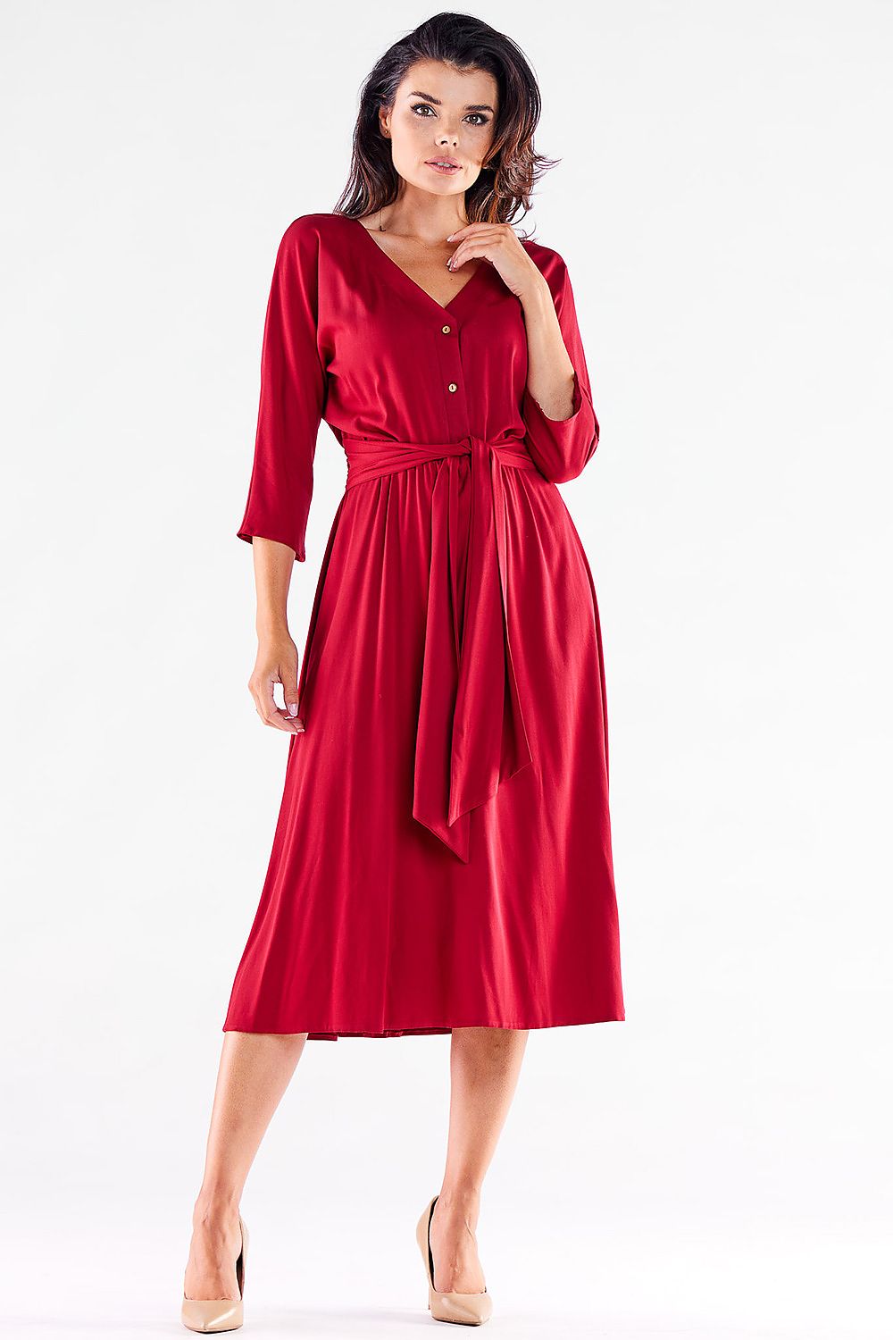 Front view of a luxurious red midi dress with a belt by awama, featuring a buttoned design and flattering silhouette.
