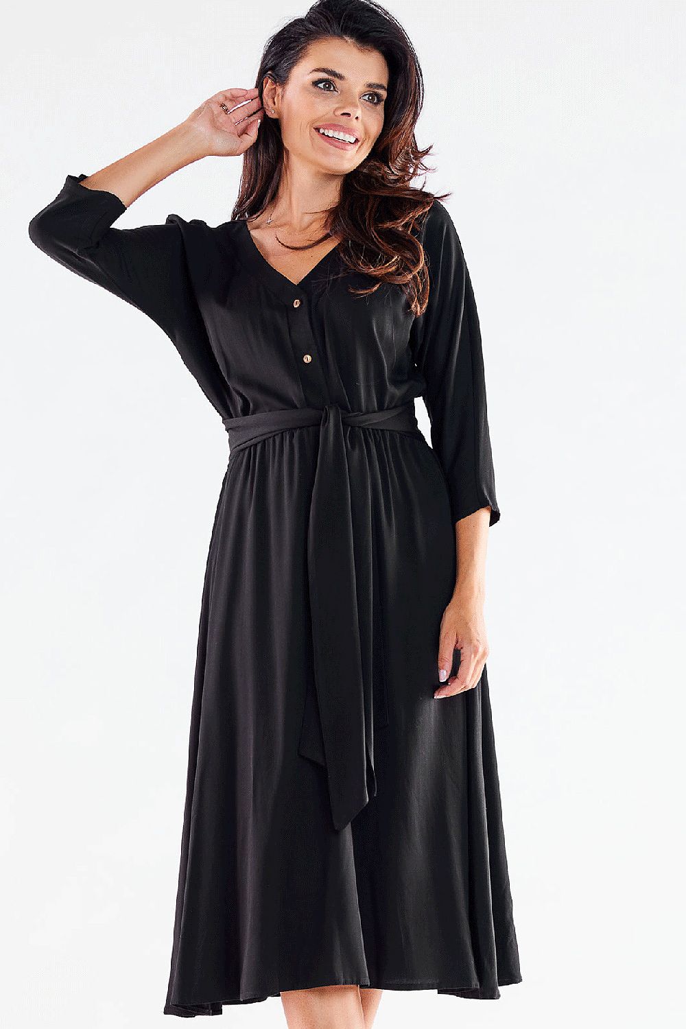 Chic black midi dress by awama with a trapezoidal hem and belt, embodying sophistication for any event.